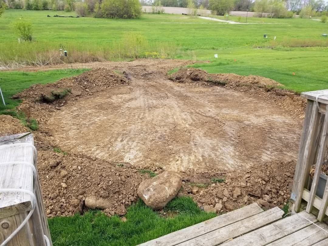 Dirt: the ground dug out and leveled around a new pool